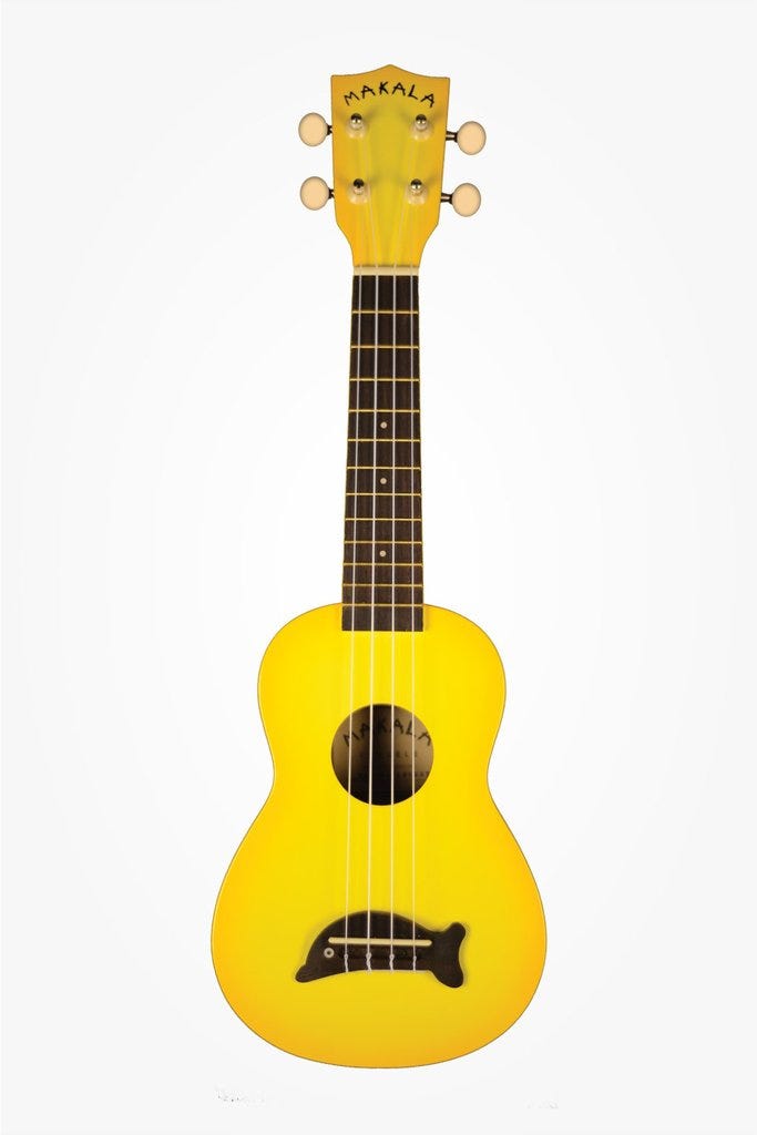 Makala Dolphin Soprano Ukulele - Yellow